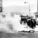 Firemen put out a rubbish blaze in street. Rioters in the San Po Kong industrial area set hundreds of street fires in an effort to slow the movement of riot patrol units in May 1967.